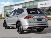 This Volkswagen Tiguan boasts a Intercooled Turbo Regular Unleaded I-4 2.0 L/121 engine powering thi... (image 4)