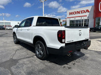 Experience the versatility of this 2022 Honda Ridgeline Touring Crew Cab Pickup, boasting a robust a... (image 6)