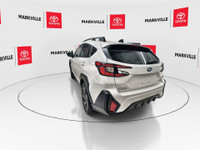 The 2024 Subaru Crosstrek Touring, particularly for the Canadian market, is a popular compact SUV th... (image 7)