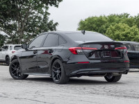 Experience the epitome of elegance and performance with the 2024 Honda Civic Sedan Sport CVT. Finish... (image 4)