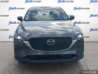 WAS: $35879 NOW: $29998 plus taxes and licensing feesExplore the 2023 Mazda CX-5 GX: A Perfect Blend... (image 1)