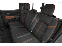 The 2025 GMC Canyon AT4 Crew Cab Short Box 4-Wheel Drive is a standout truck that commands attention... (image 9)