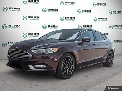 Explore the exceptional performance of the 2018 Ford Fusion in an eye-catching red with an AWD drive...