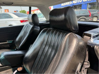 Step into timeless elegance with this beautifully preserved 1989 Mercedes-Benz 560SL, the final mode... (image 6)