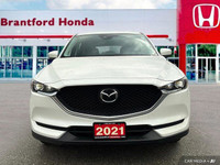 Experience the smooth handling and confident all-wheel drive of this 2021 Mazda CX-5 CX5TRXA. With o... (image 8)