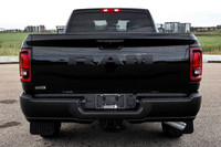 This Ram 2500 has a powerful Regular Unleaded V-8 6.4 L/392 engine powering this Automatic transmiss... (image 2)