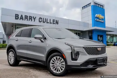 Experience the elegance of the 2024 Cadillac XT4 FWD Luxury, a silver SUV designed with precision ha...