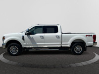 Looking for towing power and a truck that packs a punch? This WHITE Ford Super Duty pickups offer a... (image 1)