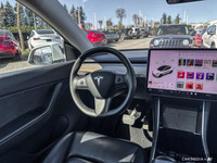 This Tesla Model Y boasts a Electric engine powering this Automatic transmission. Window Grid Antenn... (image 8)