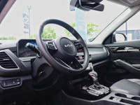 Experience rugged elegance and confident performance with the 2024 Kia Seltos EX Premium AWD in stri... (image 7)