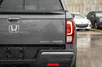 This 2019 Honda Ridgeline Touring brings together rugged capability, refined comfort, and advanced t... (image 3)
