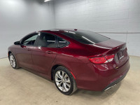 Looking for a stylish and sporty sedan that turns heads? Feast your eyes on this vibrant red 2015 Ch... (image 3)