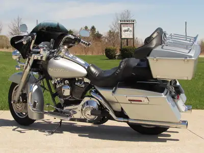 This Great Touring Harley is ready to ride, 2004 Road King Custom with over $7,000 in customizing an...
