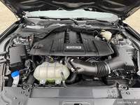 This Carbonized Grey Metallic 2022 Ford Mustang GT is an iconic sports car that delivers exhilaratin... (image 9)