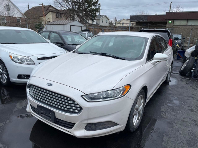  2013 Ford Fusion SE *NAV, BACKUP CAM, SAFETY, 1Y WARRANTY ENG&T in Cars & Trucks in Hamilton