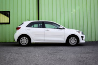 This 2021 Kia Rio 5-door is for sale today. This hatchback has 93,927 kms. It's white in colour . It... (image 1)