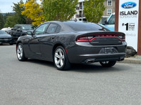 This 2018 Dodge Charger SXT has a Grey Exterior and Cream Interior with seating for 5. Equipped with... (image 4)