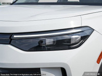 Experience the thrill of driving the new white 2025 Volkswagen Tiguan Comfortline 4MOTION, an SUV en... (image 9)