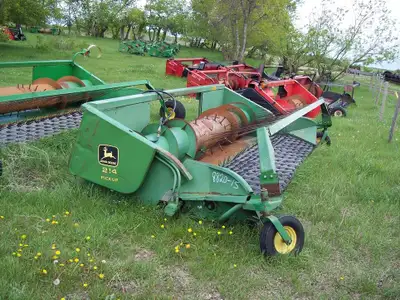 214 John Deere header with 7 belt pick-up. Ready to clip on and use as is. Call for more info. For P...