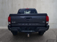 Conquer any task or trail in Ottawa with this rugged and reliable 2021 Toyota Tacoma, a mid-size pic... (image 2)