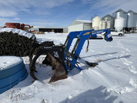 2007 New Holland Loader with Grapple 820TL