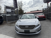 This 2016 Hyundai Sonata is a reliable sedan with a sleek gray exterior and a spacious interior in a... (image 5)