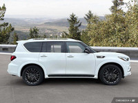 Command the road in this 2023 INFINITI QX80, a powerful SUV boasting a luxurious interior and impres... (image 6)