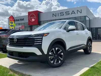 The 2025 White Nissan Kicks SV with a 2.0L DOHC 4-cylinder engine offers a refreshing blend of effic...