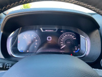 The 2023 Ram 1500 Sport in Granite Crystal Metallic boasts a bold and rugged presence, complemented... (image 4)