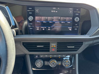 The Volkswagen Jetta Highline in a classic, sophisticated color is a stylish and efficient FWD sedan... (image 9)