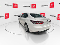 The 2024 Toyota Camry Hybrid LE is a popular and efficient mid-size sedan. It's the base trim level... (image 7)