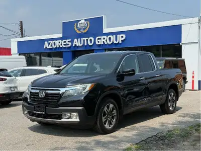 Pristine condition and Fully loaded Honda Ridgeline Touring with LOW KMs! This 4 door All Wheel Driv...