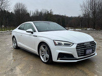 Elevate your driving experience with the 2018 Audi A5 Technik S-Line, a stunning combination of soph... (image 8)