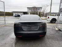 This sleek 2018 Tesla Model S in black is a stylish and eco-friendly choice for your next ride. With... (image 2)