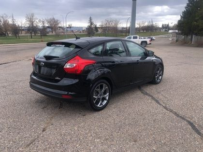 2014 Ford Focus WINTER TIRES & RIMS, LEATHER, ROOF, LOW KM'S! #2 in Cars & Trucks in Medicine Hat - Image 3