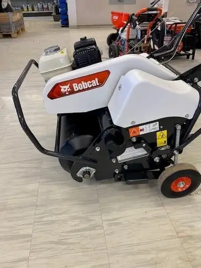 NEW Bobcat AE26 Walk Behind Aerator, Honda GX 120 Motor, 26.5in. working width, 42 hardened alloy st...