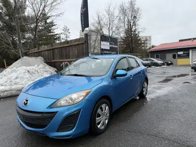 Check out this 2011 Mazda MAZDA3 Hatchback! With a sleek blue exterior and spacious interior, this c...
