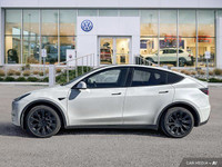 This Tesla Model Y boasts a Electric engine powering this Automatic transmission. Window Grid Antenn... (image 1)