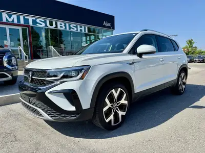 Welcome To Ajax Mitsubishi. This 2022 Volkswagen Taos Highline 4MOTION delivers versatile cargo spac...