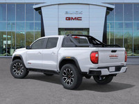 Experience bold refinement and off-road capability with this 2025 GMC Canyon AT4, finished in Summit... (image 5)