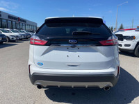 The 2019 Ford Edge SEL with a 2.0L EcoBoost engine is a charismatic midsize SUV that fuses bold desi... (image 3)