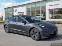 This Tesla Model 3 delivers a Electric engine powering this Automatic transmission. Window Grid Ante... (image 6)