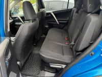 The 2017 Toyota RAV4 Hybrid XLE in a stunning blue finish offers exceptional control with its AWD dr... (image 9)
