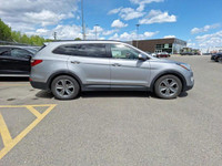 Experience the commanding presence and versatile functionality of this 2015 Hyundai Santa Fe XL Luxu... (image 2)