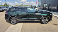The 2021 Lincoln Nautilus Reserve is a mid-size luxury SUV that offers a blend of refined design, ad... (image 5)