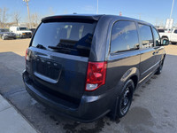 A get-it-done machine, our 2017 Dodge Grand Caravan Canada Value Package Minivan displayed in Granit... (image 4)