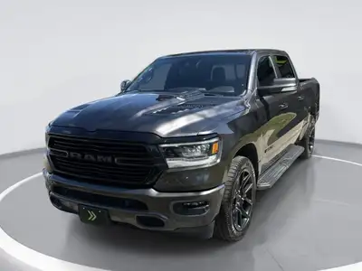 The Ram 1500 Sport GT is a stunning gray 4x4 truck designed to offer unparalleled performance and ha...