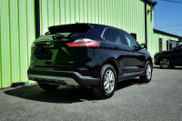 This 2022 Ford Edge is for sale today. This SUV has 92,656 kms. It's black in colour . It has a 8 sp... (image 2)