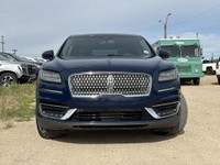 Under the glistening Rhapsody Blue exterior, the 2019 Lincoln Nautilus Reserve stands as a testament... (image 1)