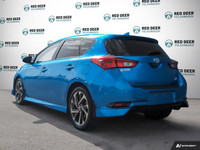 Experience the vibrant blue 2018 Toyota Corolla iM, a front-wheel-drive sedan designed for precision... (image 4)